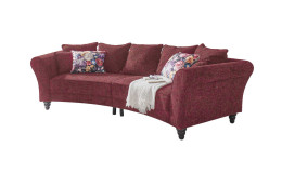 Big Sofa in Red Berry mit Kissen in Bezugsfarbe und floralem Muster