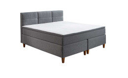 Boxspringbett Kansas in der Farbe Grau mit einem weißen Topper