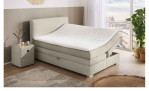 Boxspringbett Alice in der Farbe Greige mit geöffnetem Bettkasten rechts