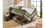 Boxspringbett Quinto Mix in der Farbe Hellgrün in einem Zimmer mit geöffnetem Bettkasten
