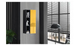 Hängeschrank Couleur in der Farbe Goldgelb im Wohnzimmer