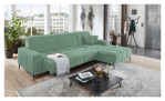 Komfort-Wohnlandschaft Luan in einem mintfarbenen Bezugsstoff mit zwei Zierkissen mit gezeigten Funktionen.  Auf einem dekorierten Hintergrund.