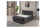 Boxspringbett Undine, in der Farbausführung anthrazit, in einem Raum stehend